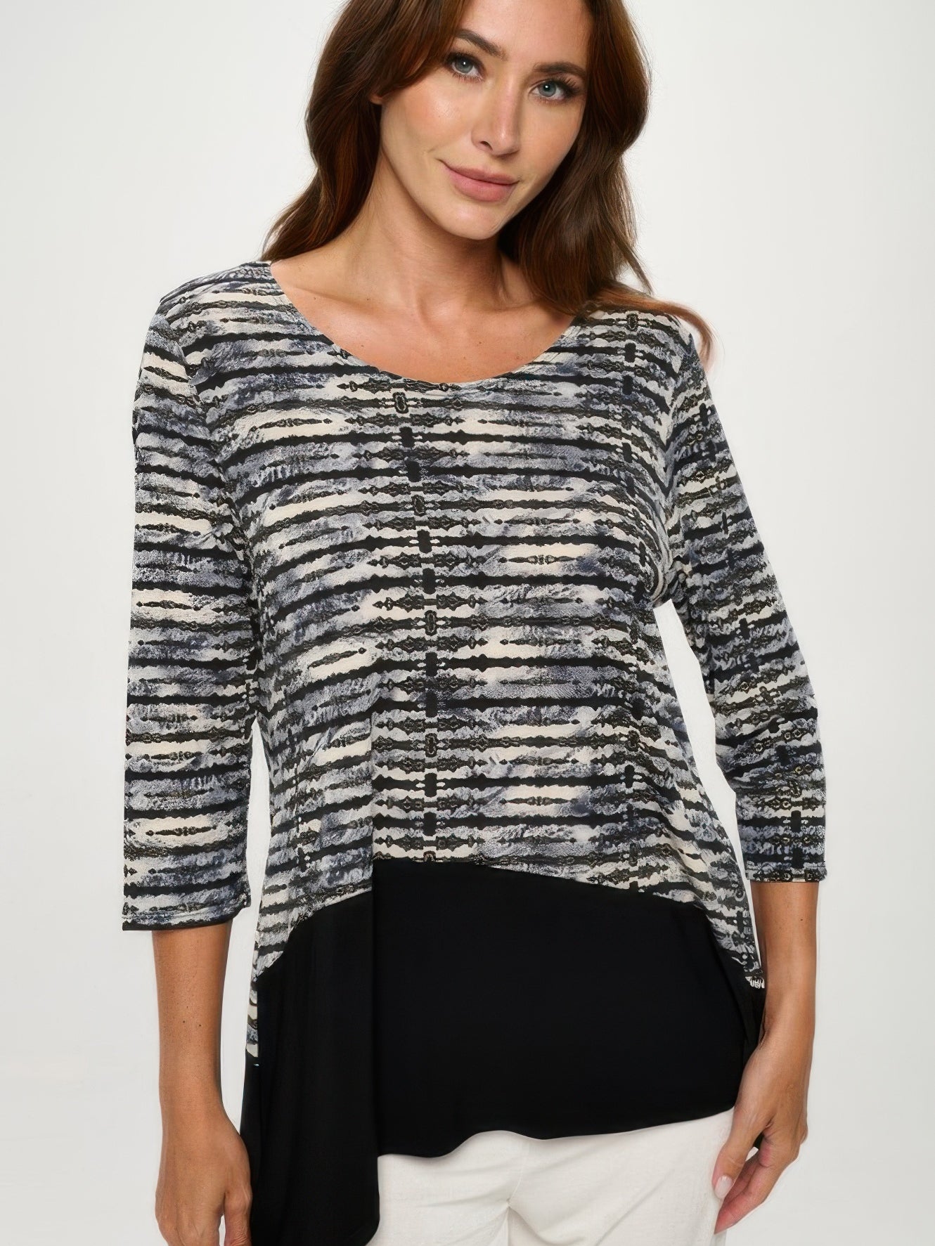Round Neck Quarter Sleeve Top featuring a stylish design and comfortable fit, perfect for versatile day-to-night wear.