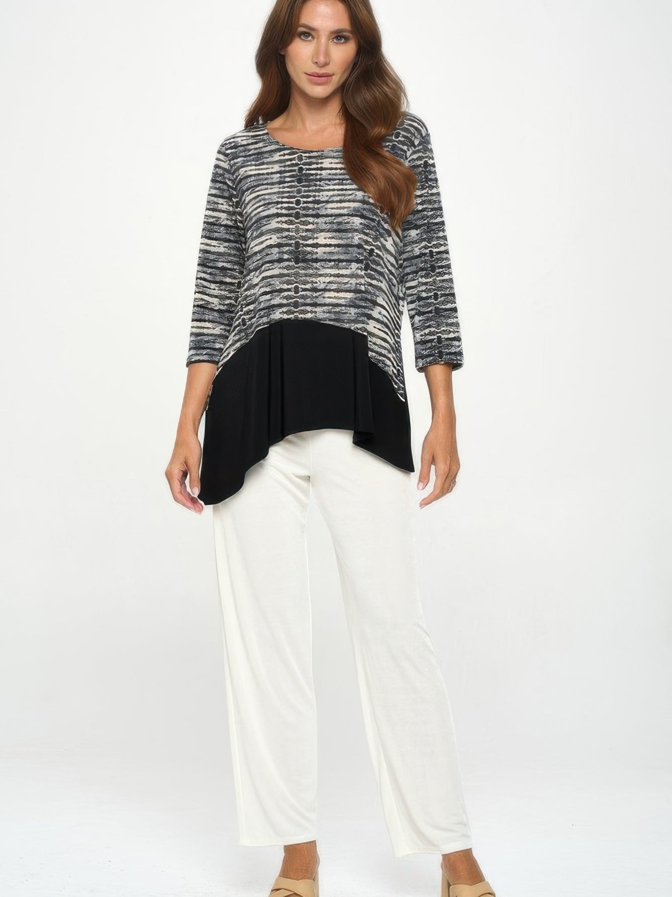 Round Neck Quarter Sleeve Top featured with stylish black and white design, paired with white pants, perfect for casual outings.