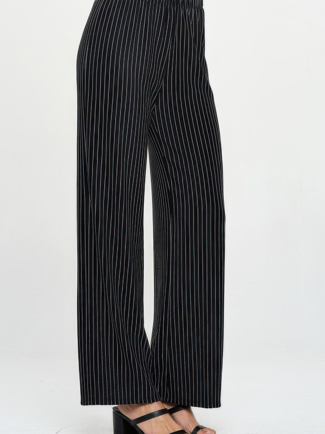 Ottoman Flared Pants in black and white stripes, featuring a comfortable waistband and stylish wide leg design.