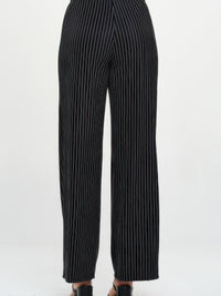 Ottoman Flared Pants in black with vertical stripes, showcasing the back view and relaxed fit.