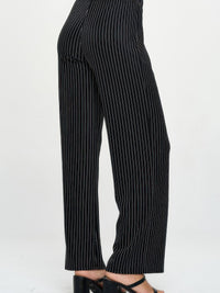 Ottoman Flared Pants featuring a sleek design and vertical stripes, perfect for a stylish and comfortable look.