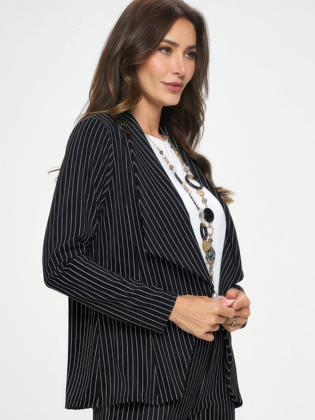 Ottoman Pinstripe Front Drape Jacket on a model, featuring a draped open front and subtle pinstripe design.