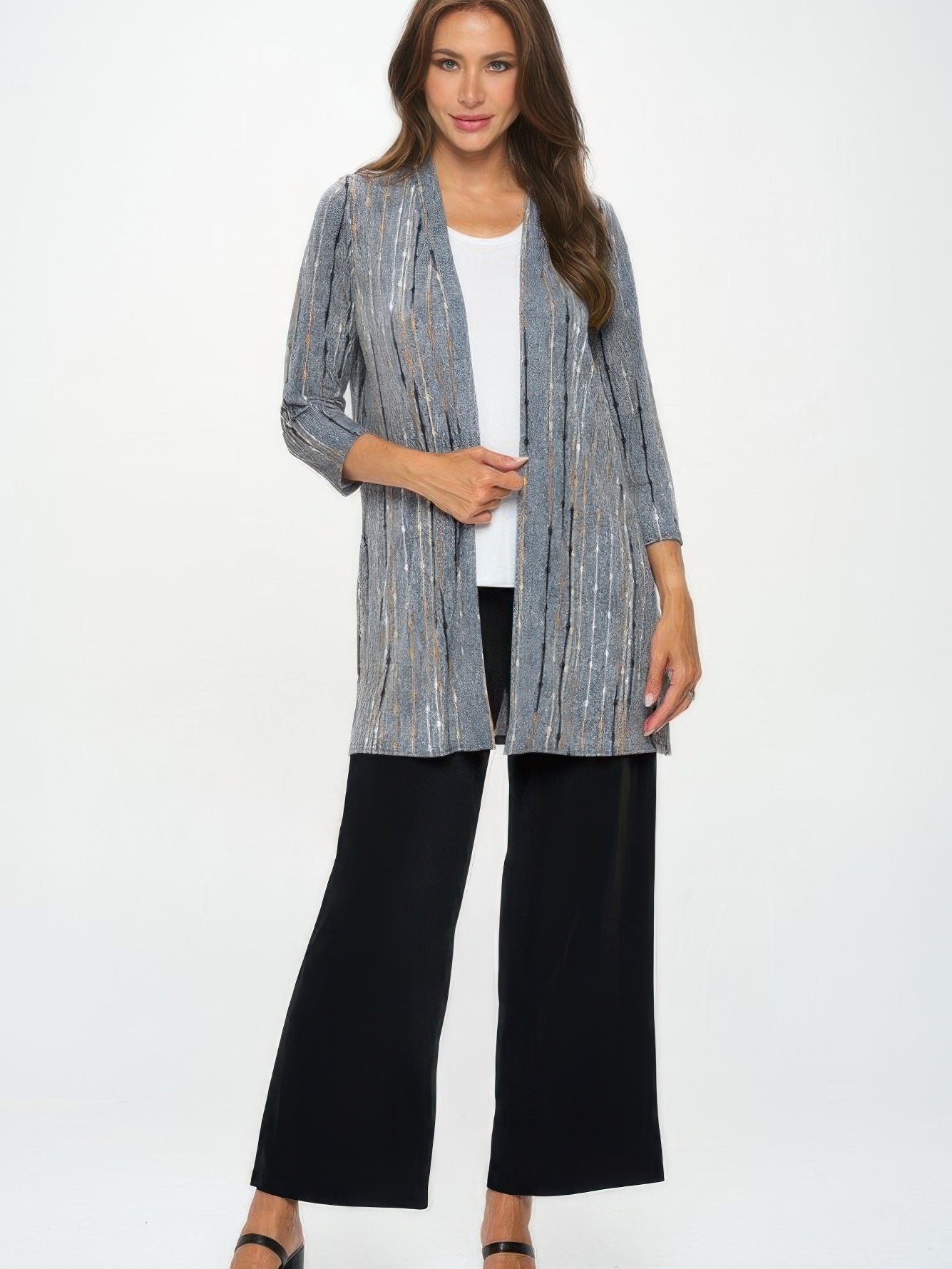 Long Sleeve Cardigan worn by a woman, featuring a lightweight drape and bold printed finish.