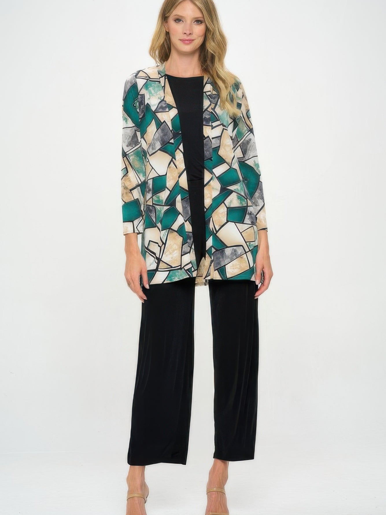 Long Sleeve Cardigan featuring a bold printed design, paired with a sleek black outfit for a stylish look.