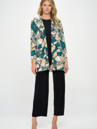 Long Sleeve Cardigan featuring a bold printed design, paired with a sleek black outfit for a stylish look.
