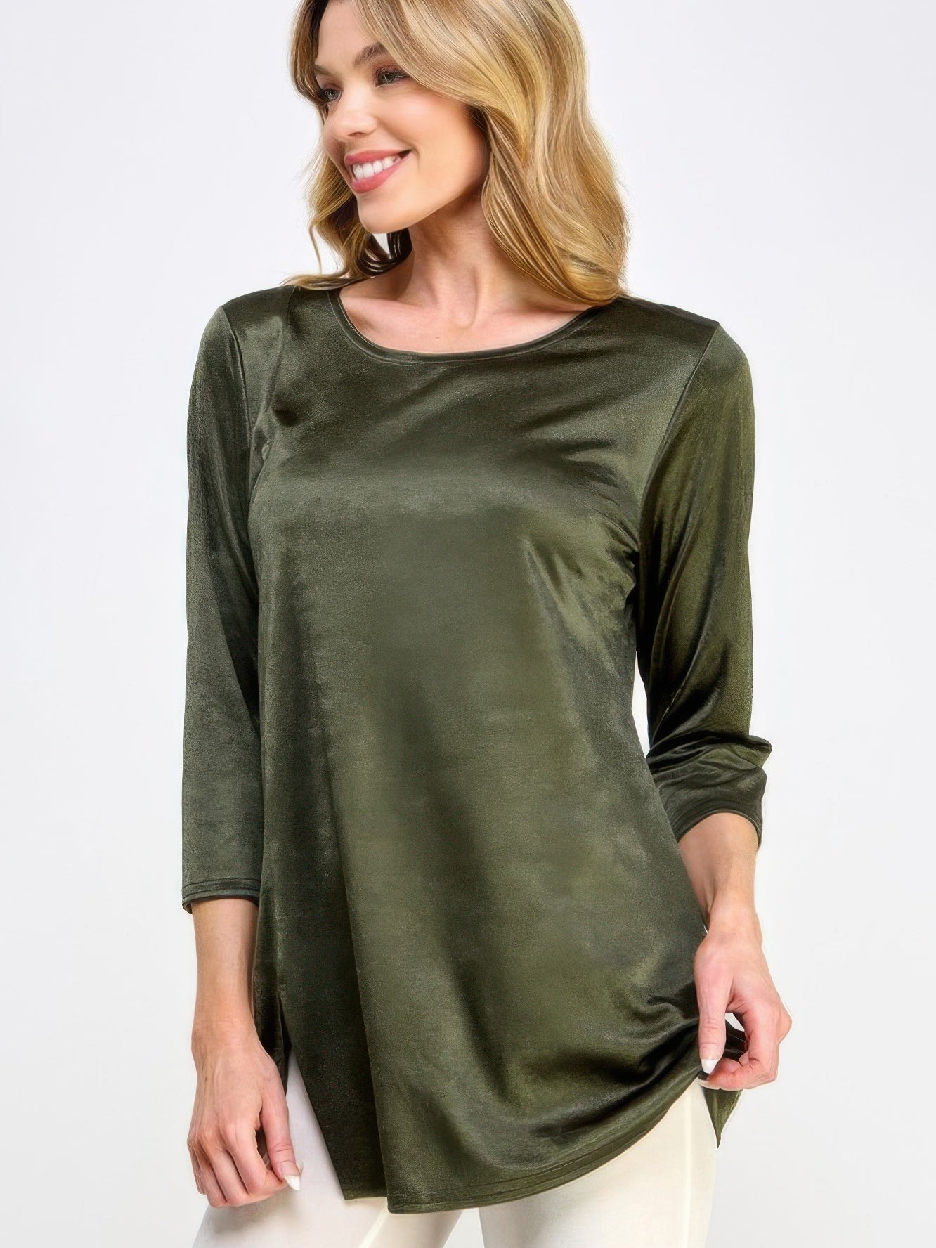 Washed Satin Elegance Top featuring a model wearing a green satin top with three-quarter sleeves and a round neckline.