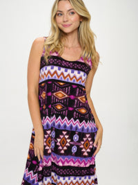 Model wearing a vibrant Sleeveless Tank Dress with Round featuring colorful geometric patterns.