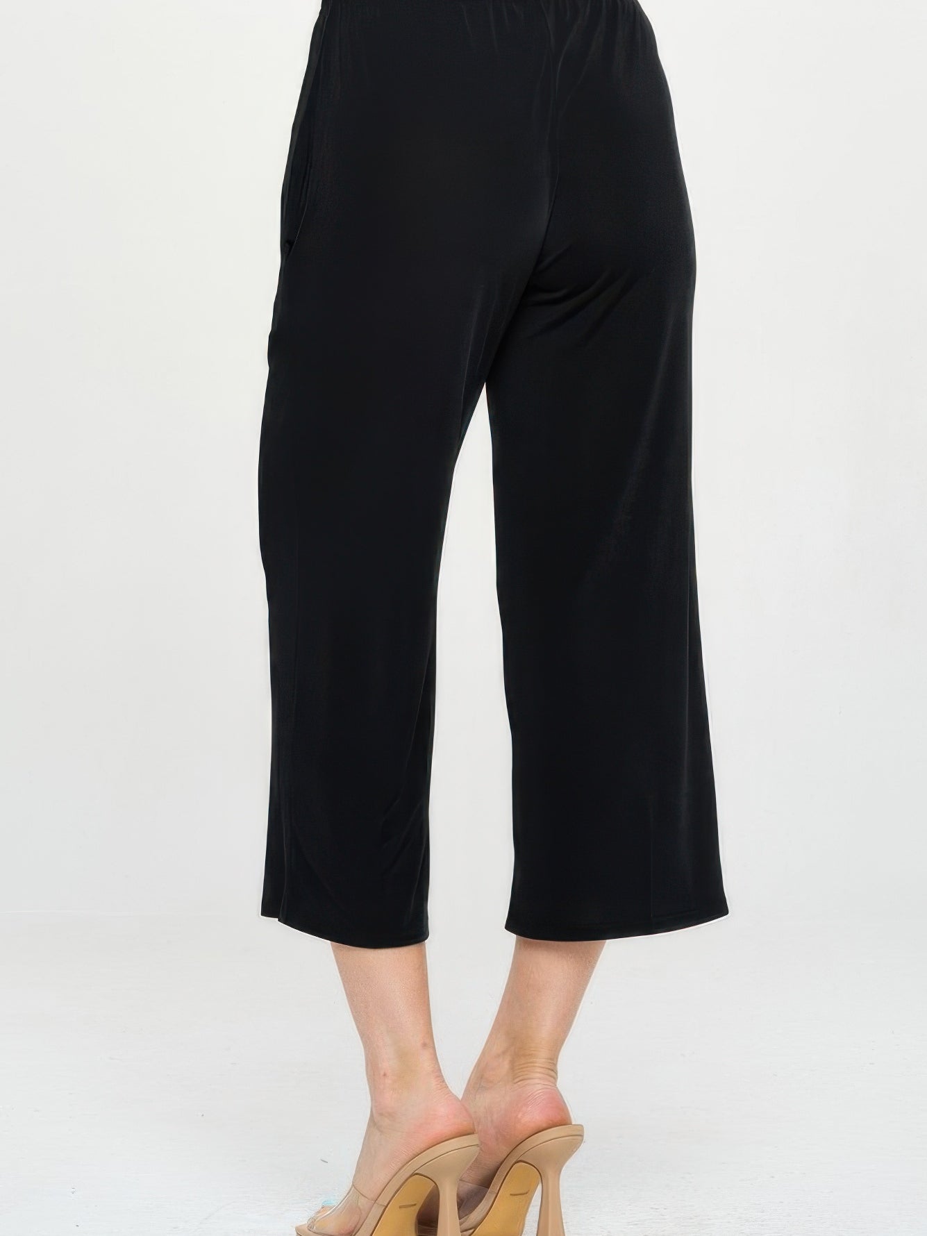 Back view of Elastic Waistband Ankle Pants with Pockets in black, featuring a comfortable fit and stylish design.