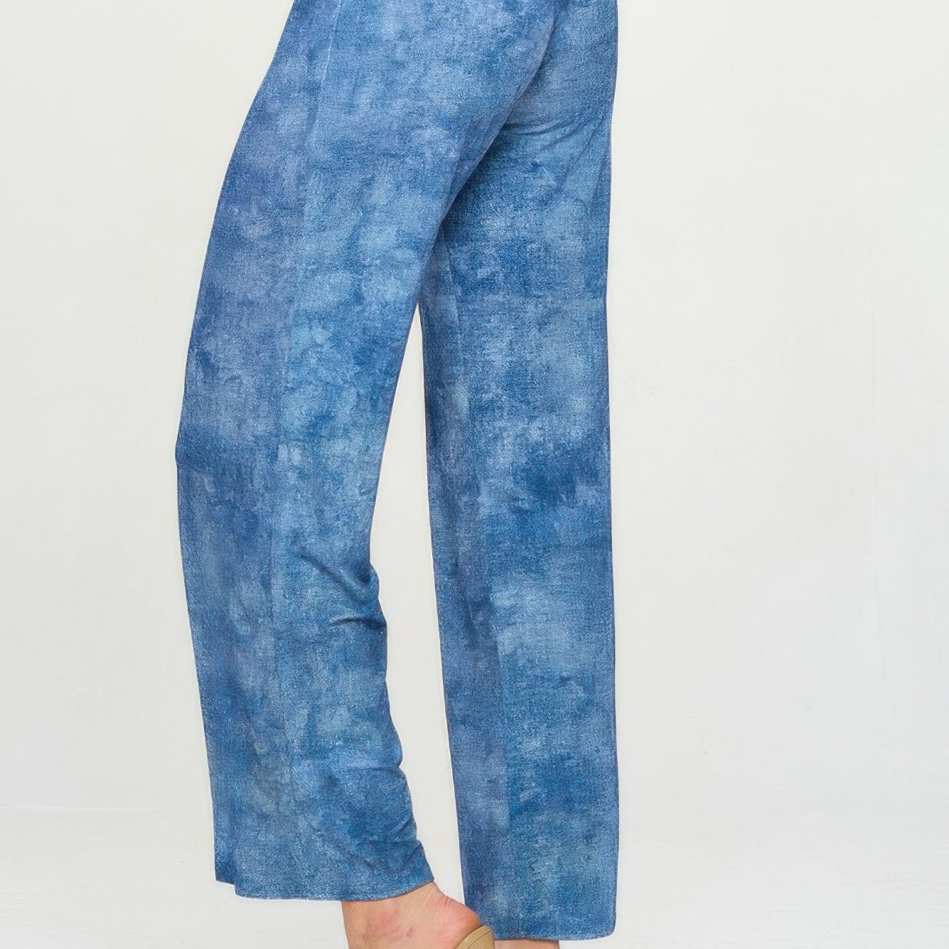 Elastic Waistband Flared Pants in blue denim print with a comfortable fit and stylish flare.