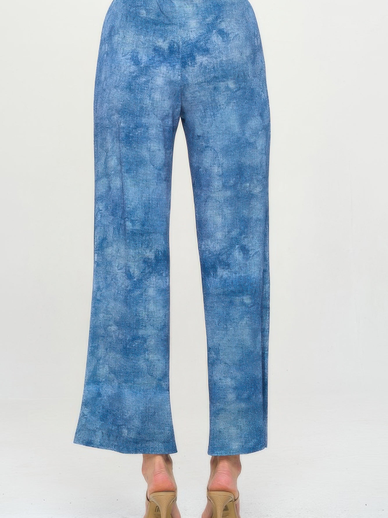 Back view of Elastic Waistband Flared Pants in blue denim print, featuring a comfortable elastic waistband.