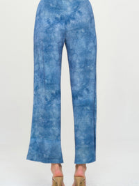 Back view of Elastic Waistband Flared Pants in blue denim print, featuring a comfortable elastic waistband.