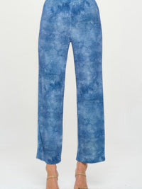 Elastic Waistband Flared Pants in blue denim print with full-length flare and elastic waistband for comfort.