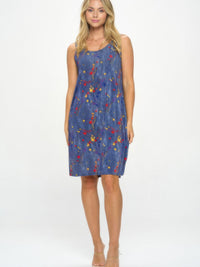 BNS Missy Tank Dress shown on a model, featuring a colorful floral design and a silhouette perfect for summer wear.
