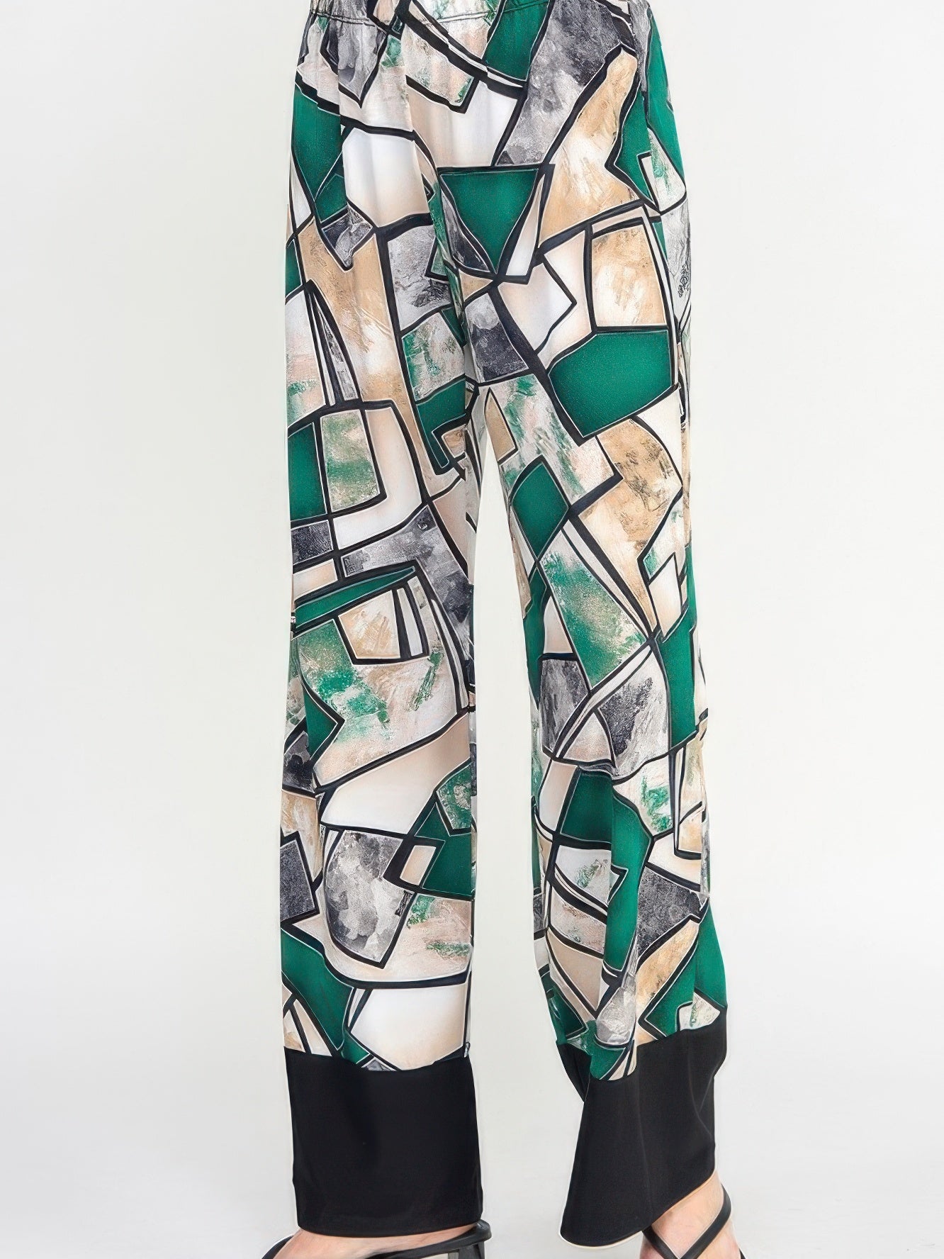 HIT Flared Pants featuring a colorful geometric pattern, perfect for versatile day or evening dressing.