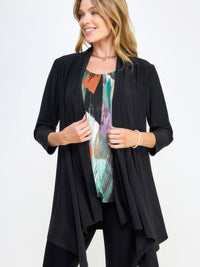 Draped Quarter Jacket worn by a woman, showcasing an elegant draped front and quarter-length sleeves.