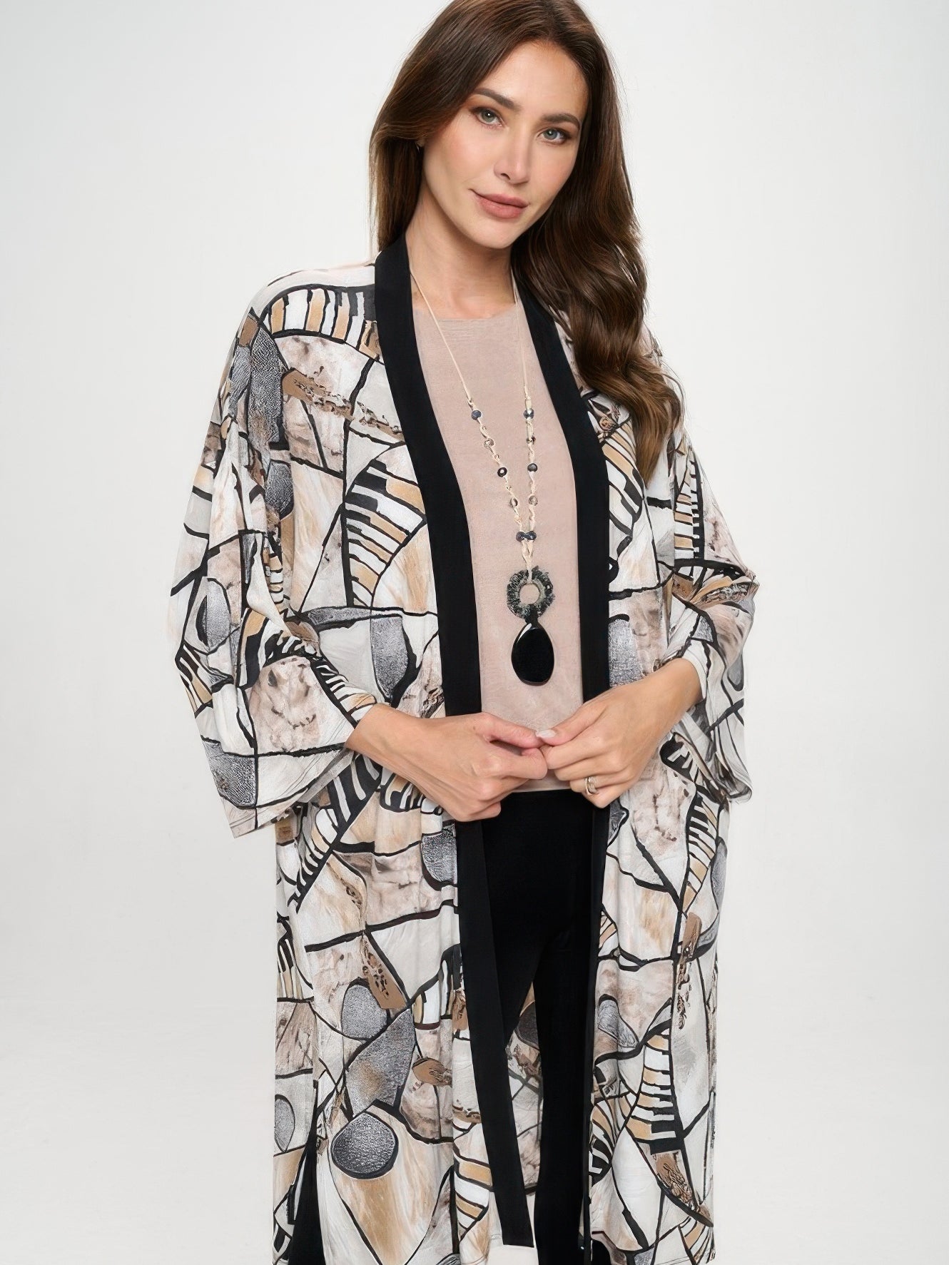 Long Contrast Jacket worn by a model, featuring unique patterns and relaxed fit, perfect for stylish layering.