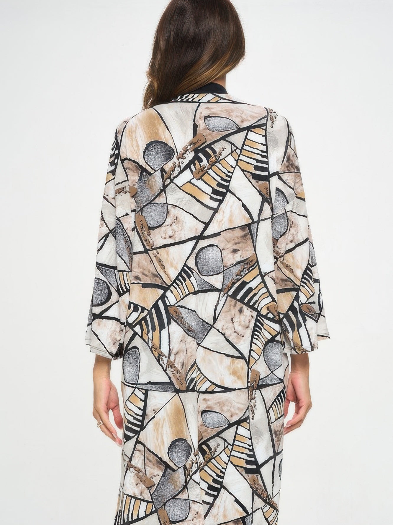 Long Contrast Jacket featuring a unique geometric print and quarter-length sleeves, ideal for a polished look.