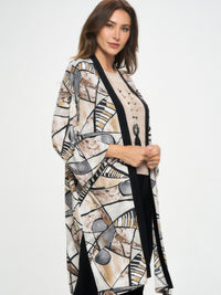Long Contrast Jacket worn by a model, showcasing a stylish design with quarter-length sleeves and unique patterns.