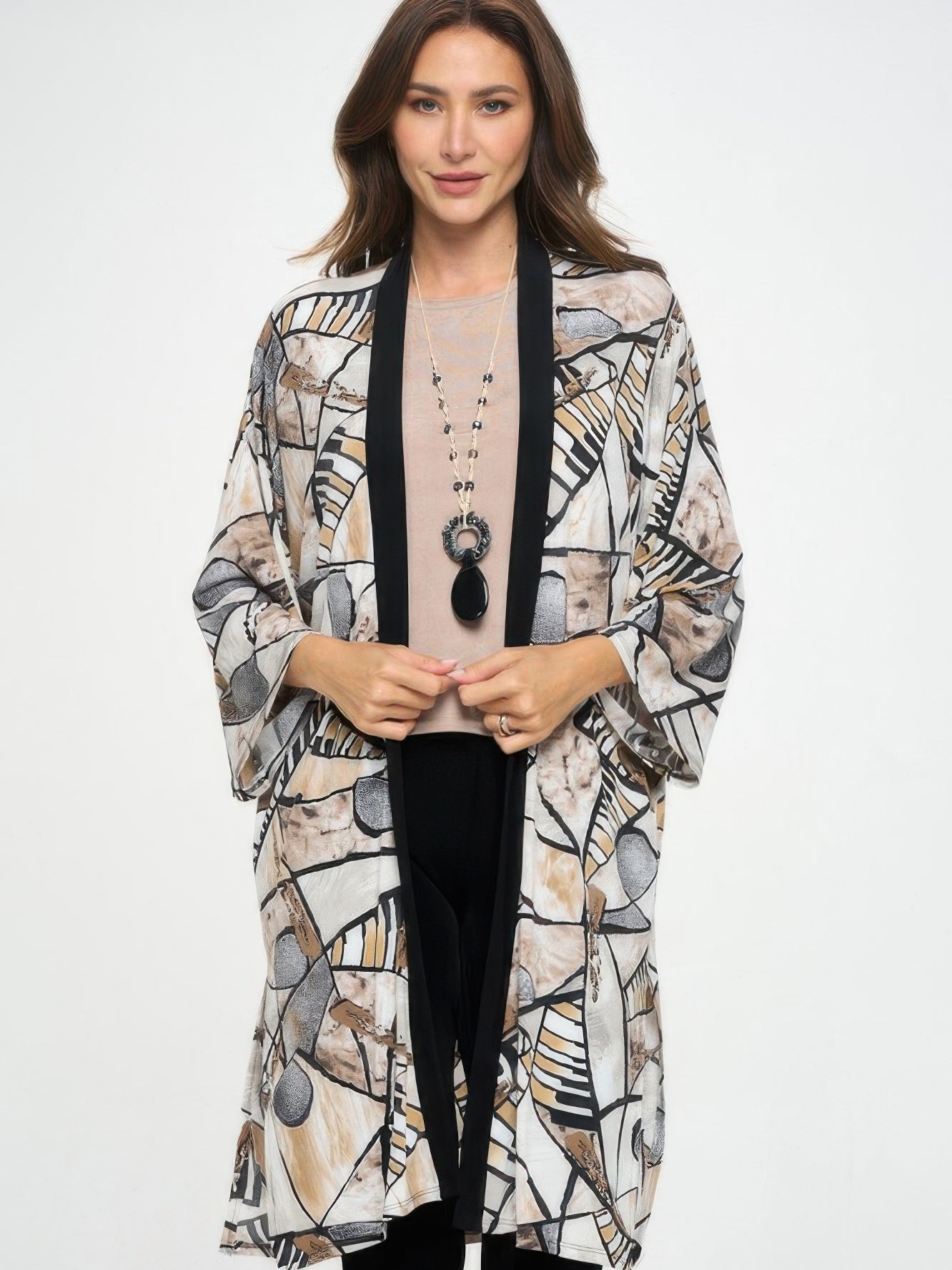 Long Contrast Jacket featuring artistic patterns and quarter-length sleeves, perfect for elegant layering.