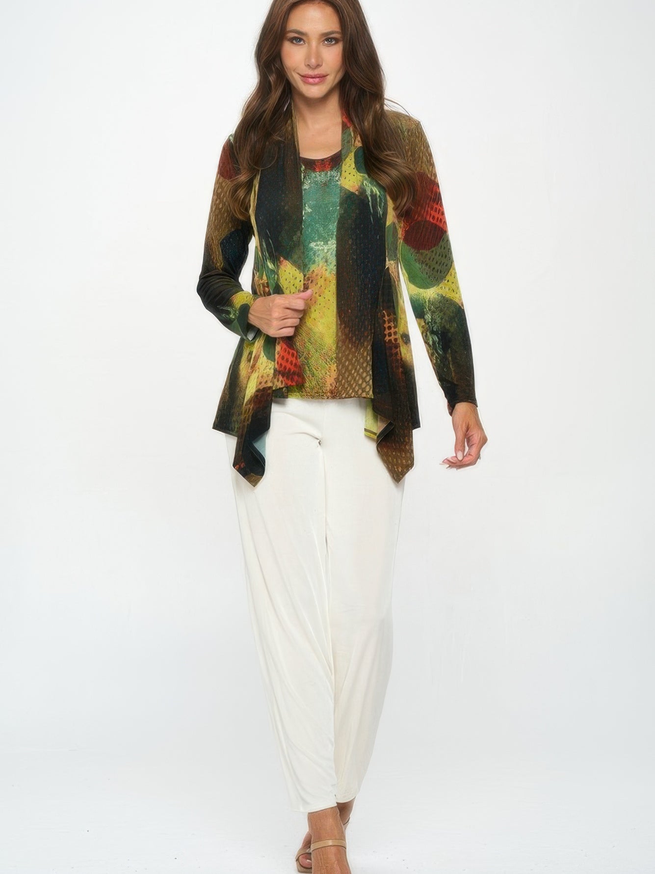 Model wearing HIT Mid Cut Jacket with vivid print, paired with white pants, showcasing a stylish look for transitional weather.