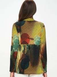 Woman wearing the HIT Mid Cut Jacket in a vibrant print, showcasing the back view and long sleeves.