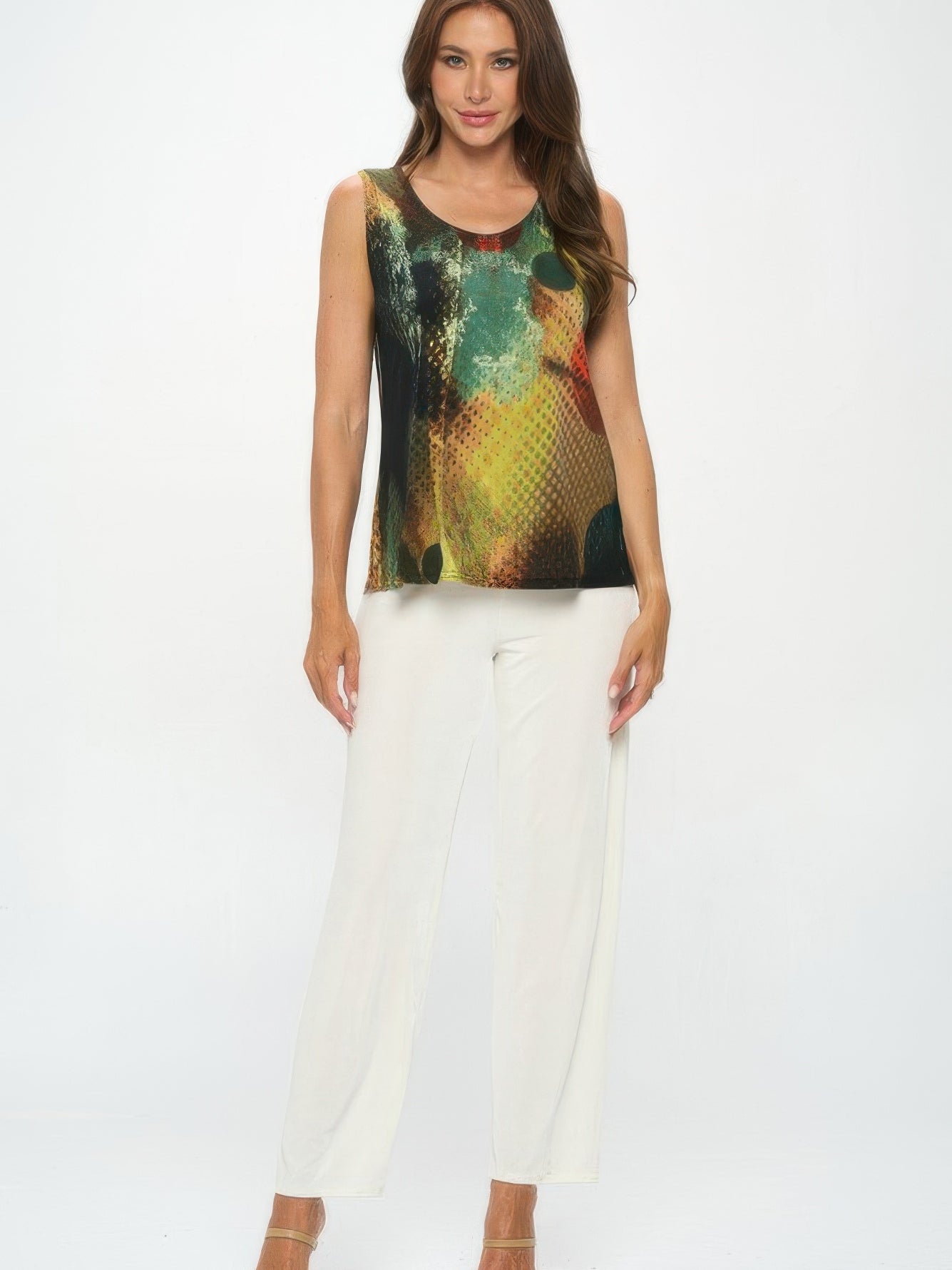Model wearing HIT Print Sleeveless Tank Top with colorful print and white pants, showcasing a stylish summer outfit.