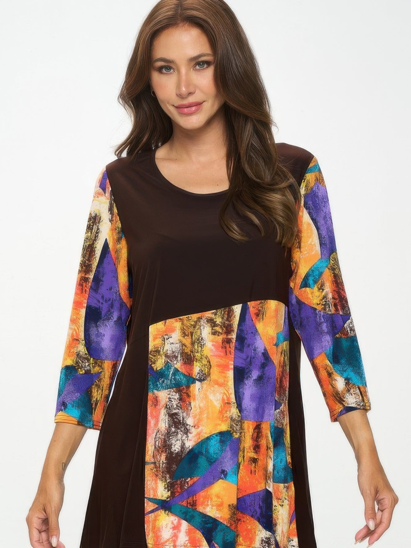 Contrast Curve Knit Top featuring a colorful design with a brown base and artistic patterns, offering a modern and stylish look.