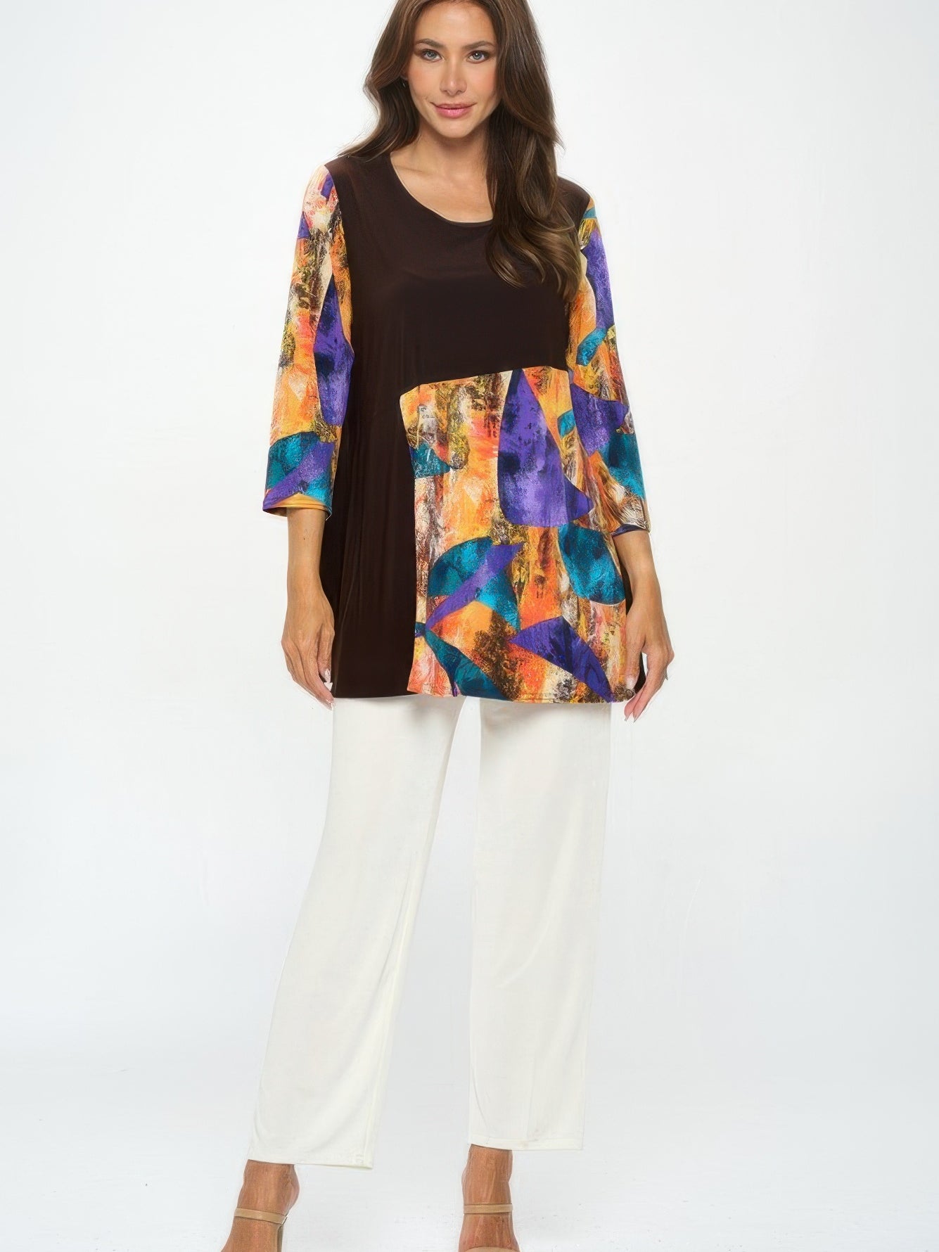 Contrast Curve Knit Top modeled with colorful accents and elegant design, showcasing its versatile style.