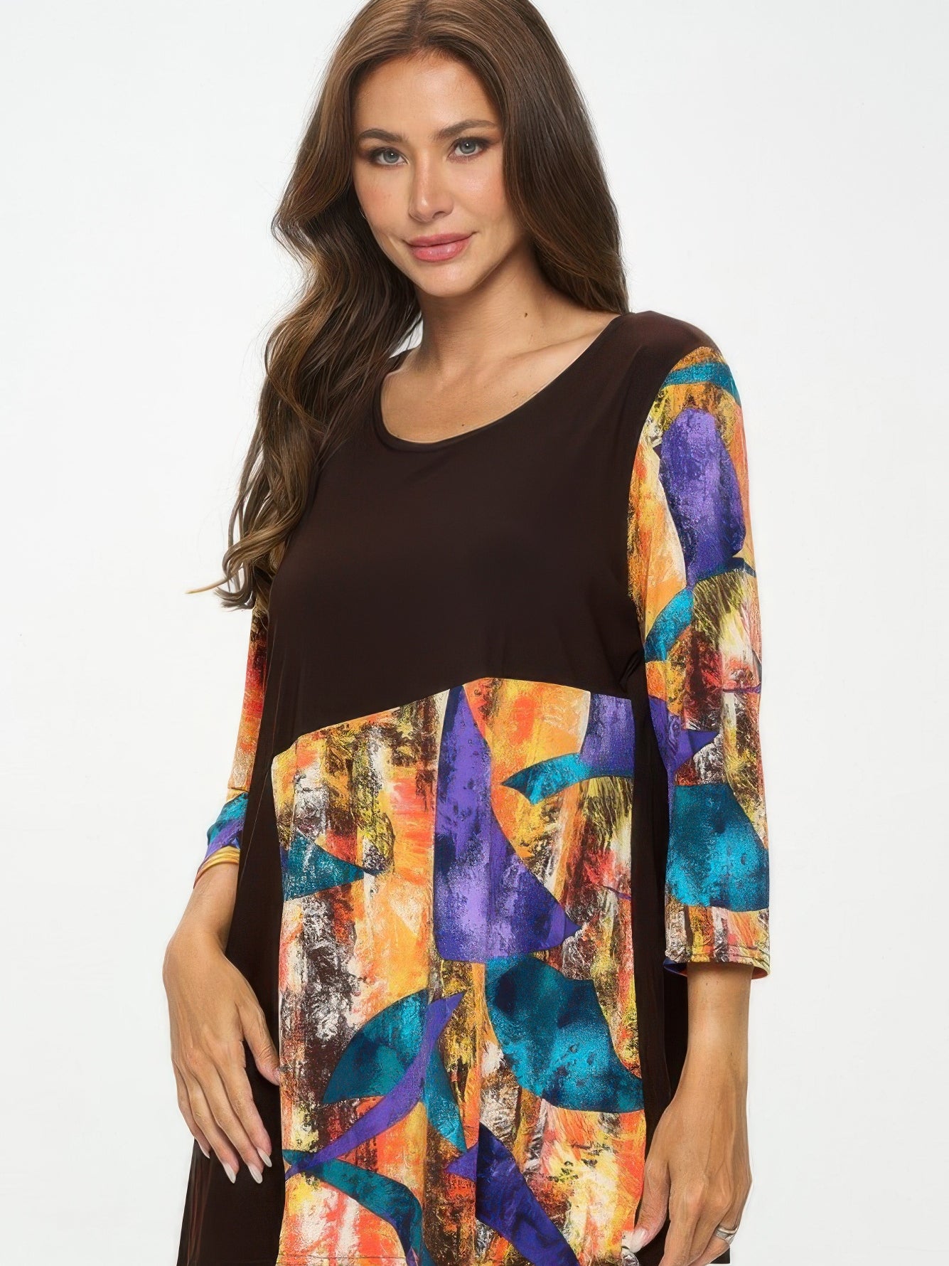 Contrast Curve Knit Top featuring colorful curved color-blocking design and quarter sleeves.