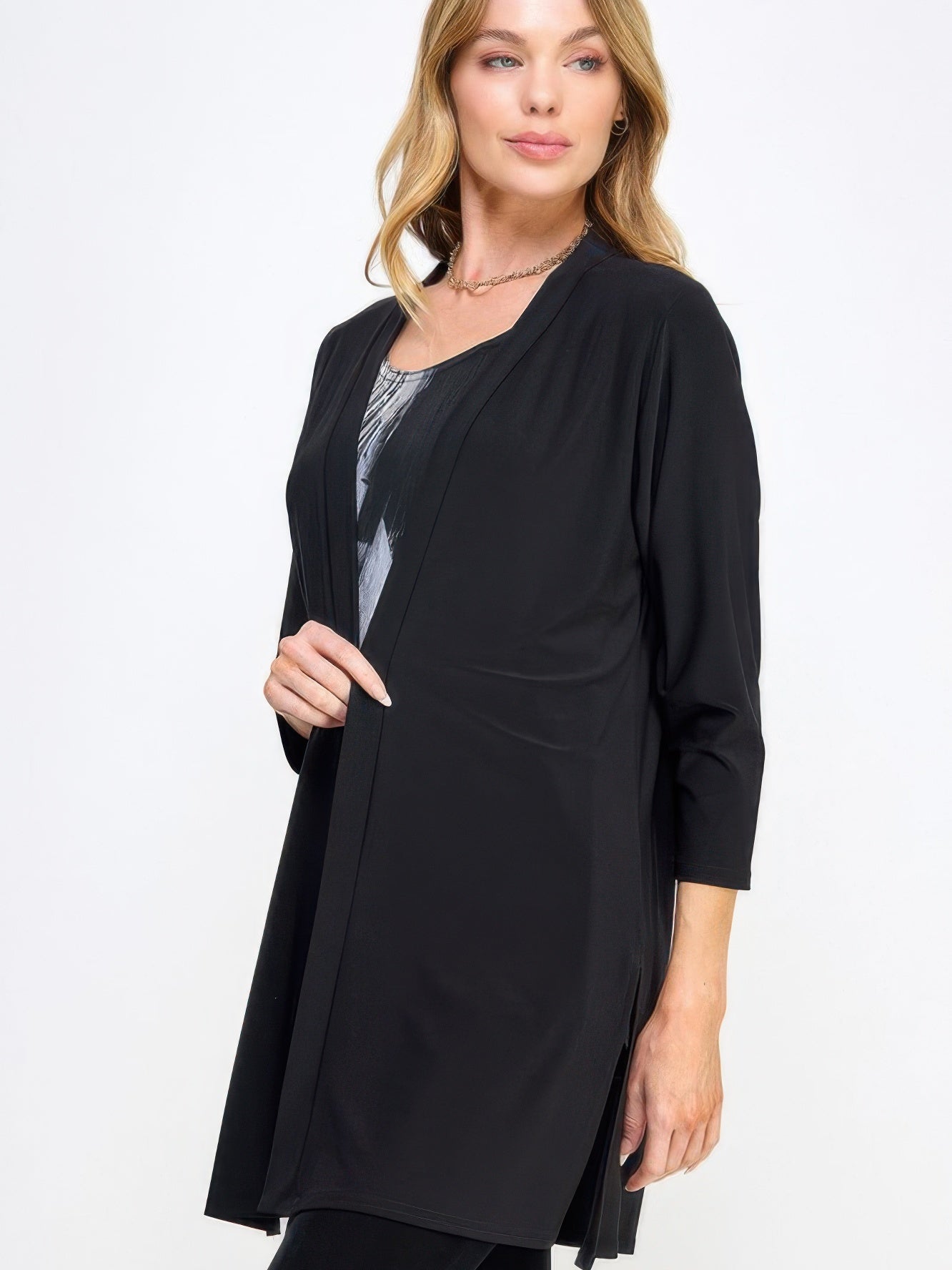 Hit Duster Jacket in black, featuring a relaxed open front and lightweight stretch fabric for stylish layering.