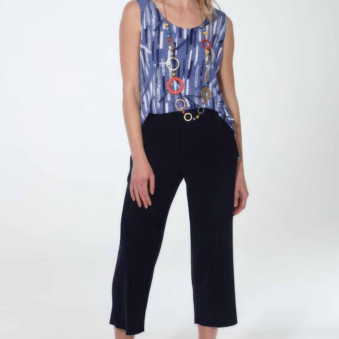 Model wearing Hit Wide Leg Ankle Length Pants with a stylish top, showcasing relaxed sophistication and comfort.
