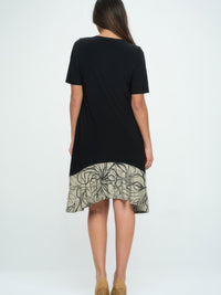 Hit Half Sleeve Contrast Dress showcased from the back, featuring a black top and patterned skirt.