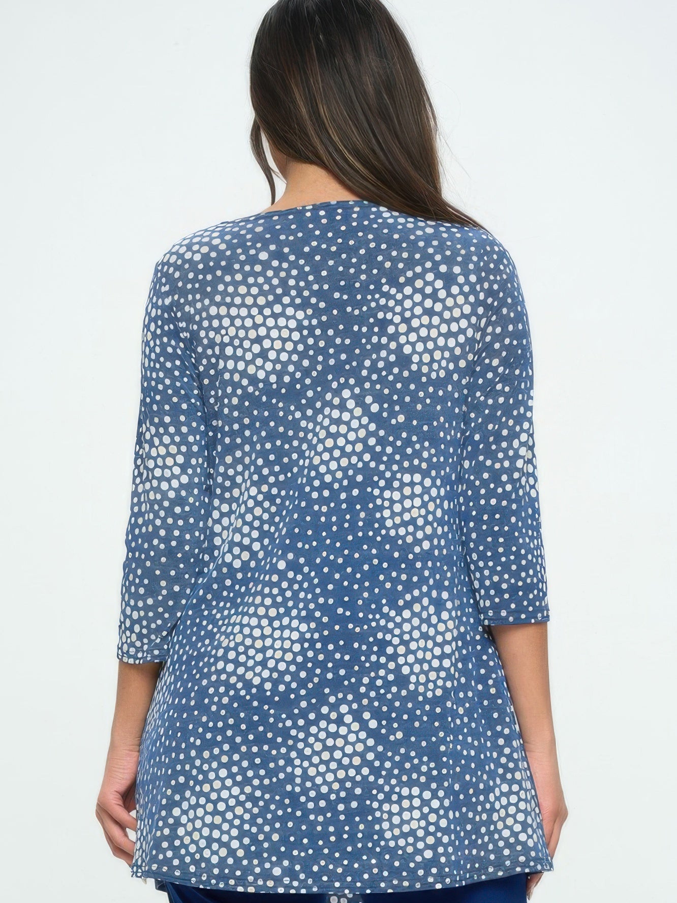 Back view of Hit Round Neck Tunic With Pocket featuring a navy polka dot pattern and quarter sleeves.