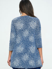Back view of Hit Round Neck Tunic With Pocket featuring a navy polka dot pattern and quarter sleeves.