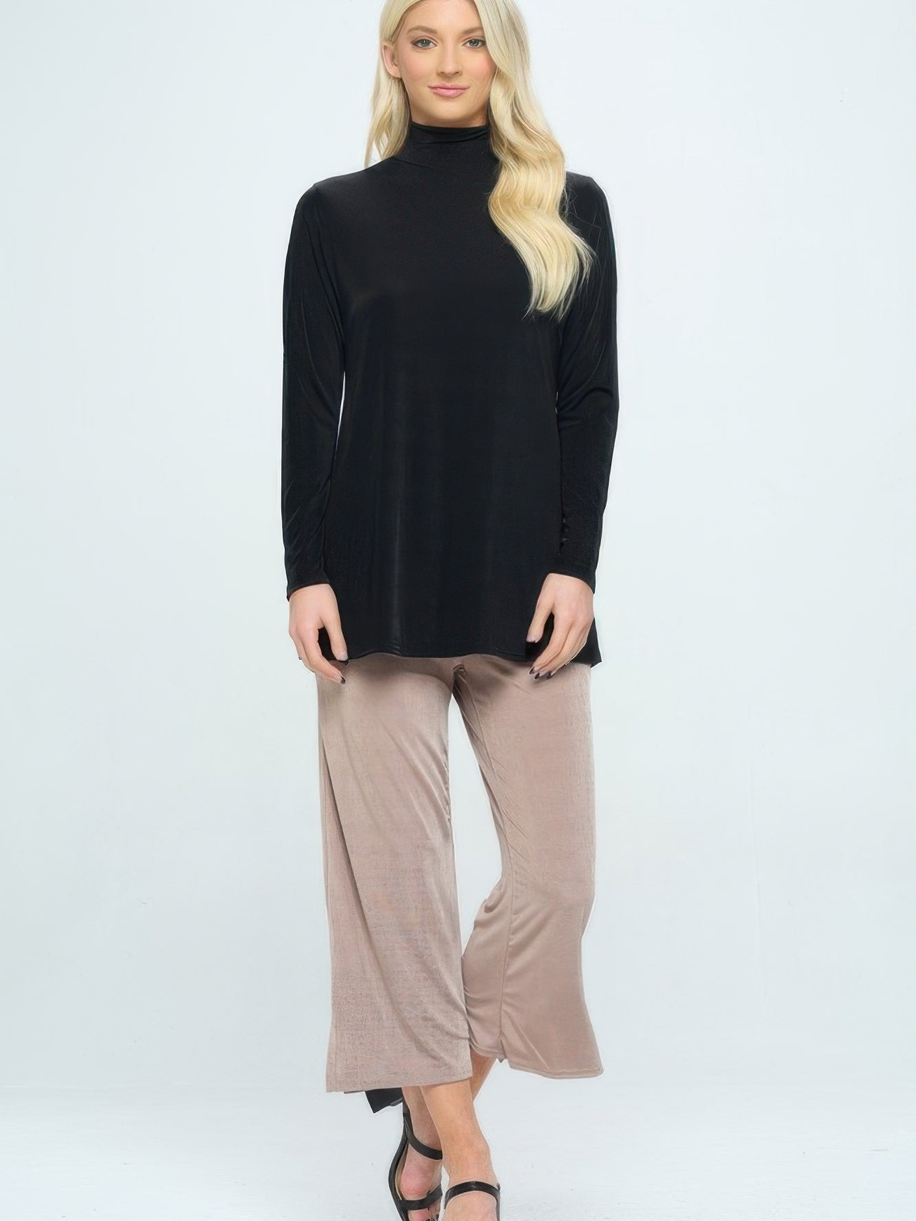 BNS Mock Turtle Neck Top shown in a chic outfit, featuring a mock neckline and relaxed silhouette, ideal for stylish layering.