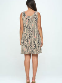 Hit Missy Tank Dress - Back view of a stylish sleeveless dress featuring a unique print, perfect for warm-weather occasions.