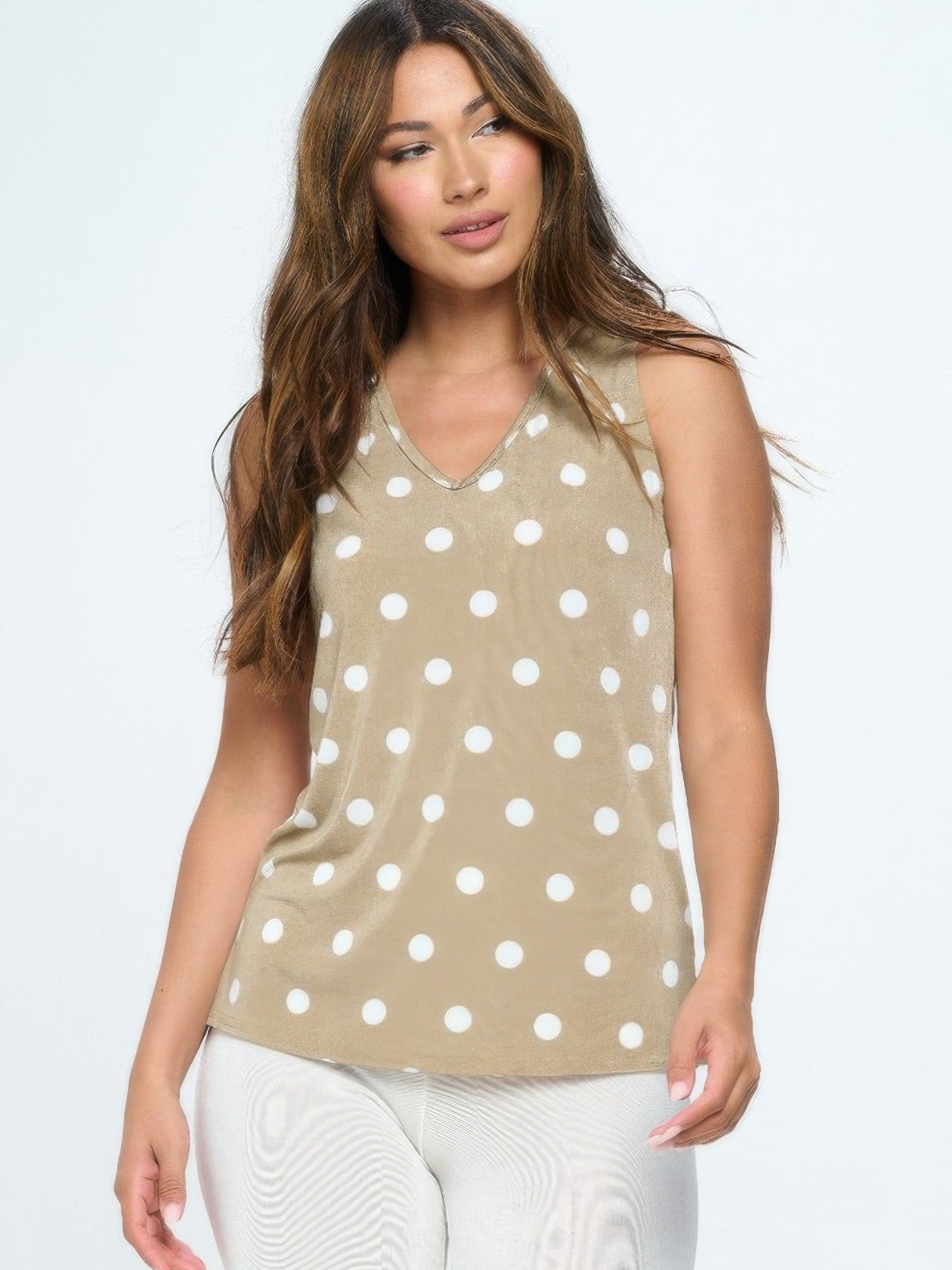 BNS V-Neck Bias Tank Top worn by a model, featuring a polka dot design on a beige background.