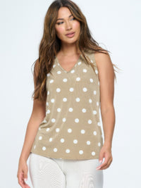 BNS V-Neck Bias Tank Top worn by a model, featuring a polka dot design on a beige background.