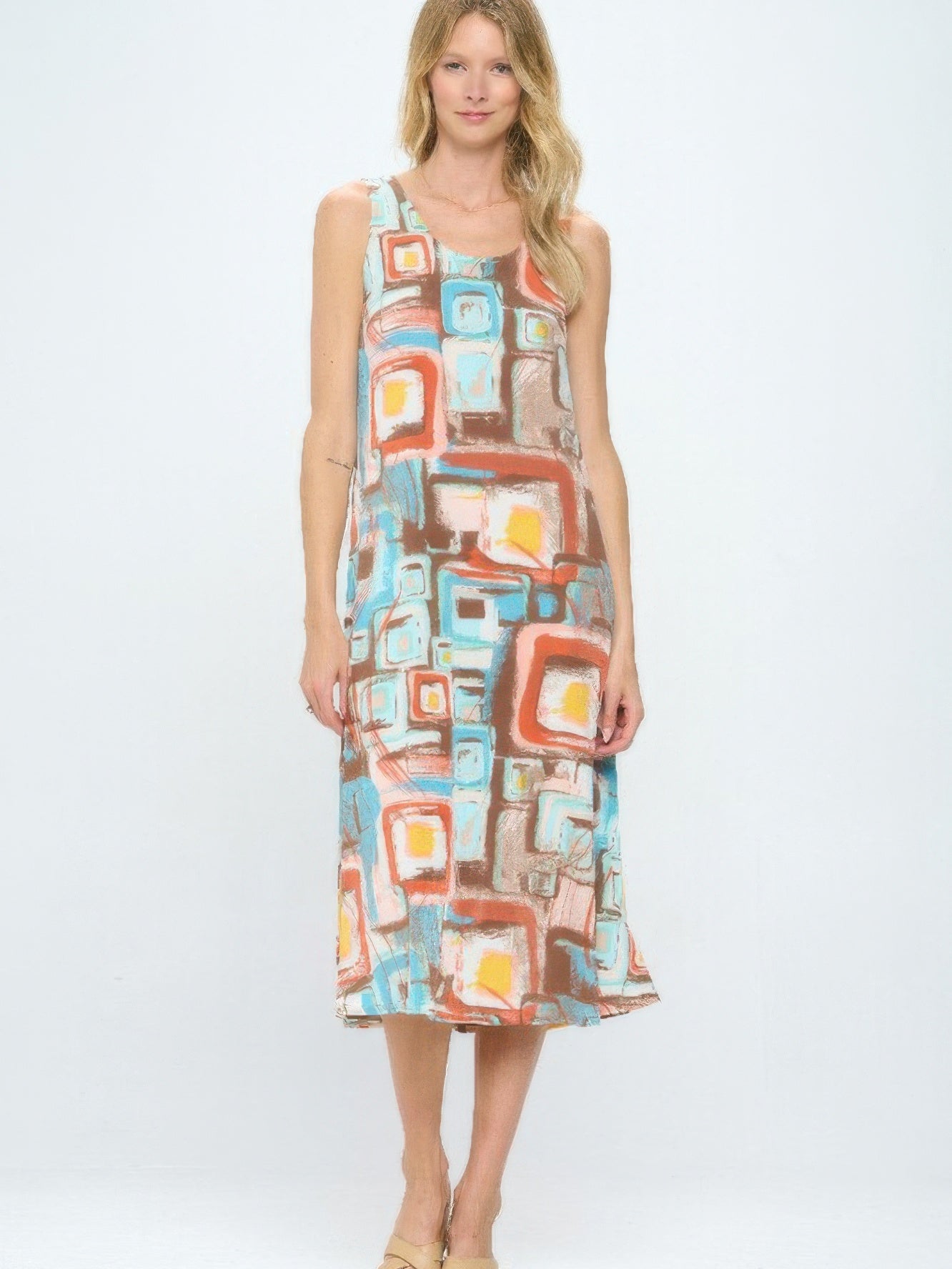 Short Sleeve And Soft Round-Neckline Long Dress featuring a colorful abstract print and relaxed fit, perfect for warm weather.