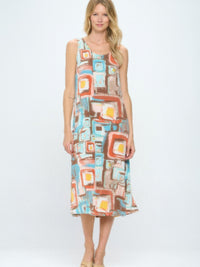 Short Sleeve And Soft Round-Neckline Long Dress featuring a colorful abstract print and relaxed fit, perfect for warm weather.