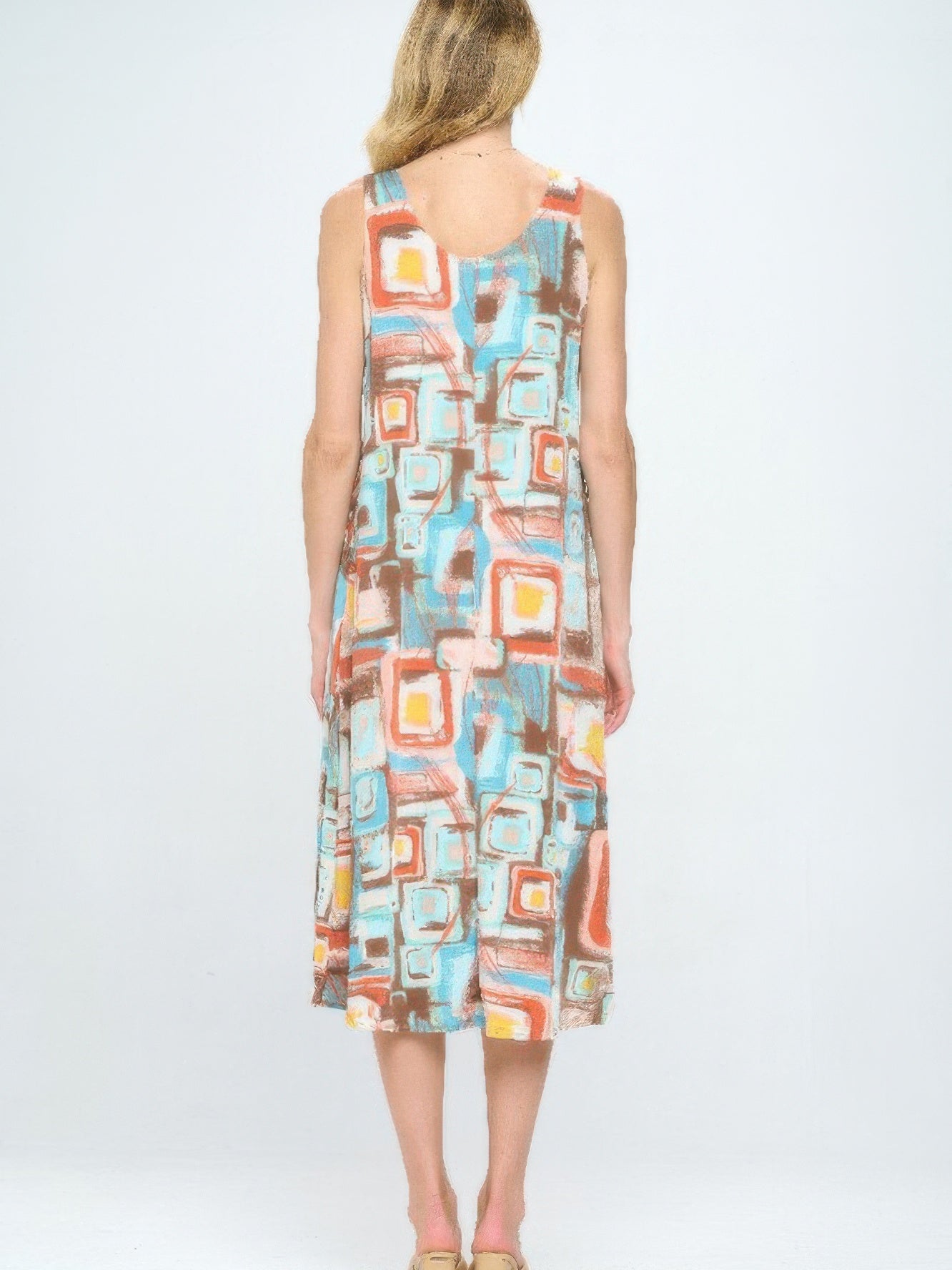 Short Sleeve And Soft Round-Neckline Long Dress in a colorful abstract print, shown from the back view.