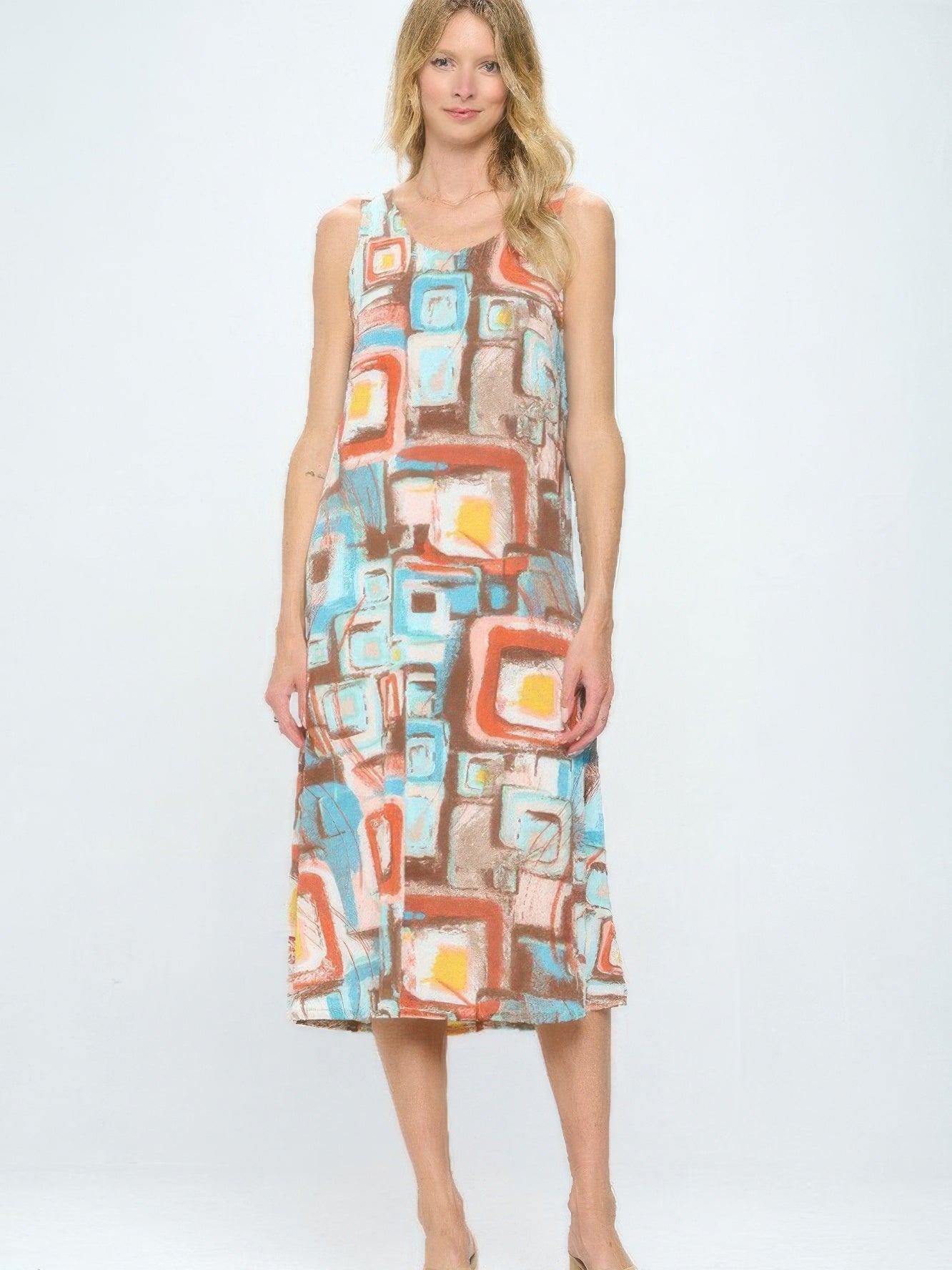 Short Sleeve And Soft Round-Neckline Long Dress featuring a colorful geometric print, perfect for warm weather styling.