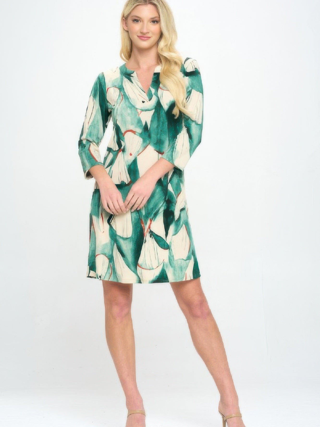 Hit Notch Neck Quarter Sleeve Dress in a green and cream leaf print, featuring a flattering notch neckline and quarter-length sleeves.