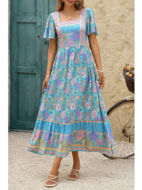 Square Neck Boho Floral A Line Fit Dress featuring a vibrant design with a flared skirt and short sleeves.