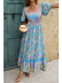 Square Neck Boho Floral A Line Fit Dress featuring a colorful floral print and relaxed silhouette.