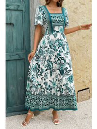 Square Neck Floral Printed Ankle Length A Line Dress showcased in teal floral print against a rustic backdrop.