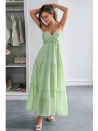 Solid Halter Muse Tiered Ruffle Long Dress in light green, showcasing a flowy, elegant design with ruffled layers and halter neckline.