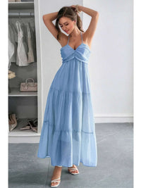 Solid Halter Muse Tiered Ruffle Long Dress in light blue, featuring a halter neckline and flowy ruffled layers.