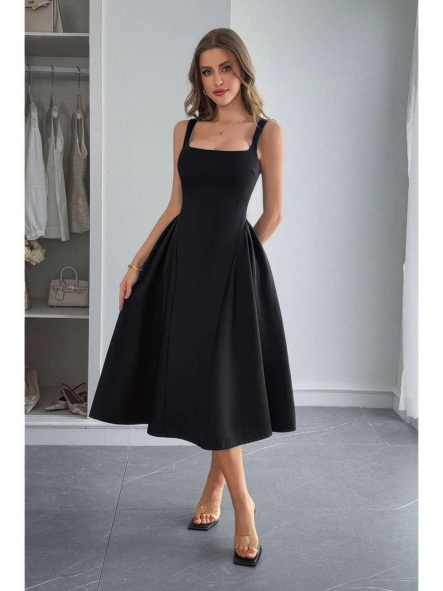 Square Neck A Line Pleated Sleeveless Long Dress worn by a model in a stylish indoor setting.