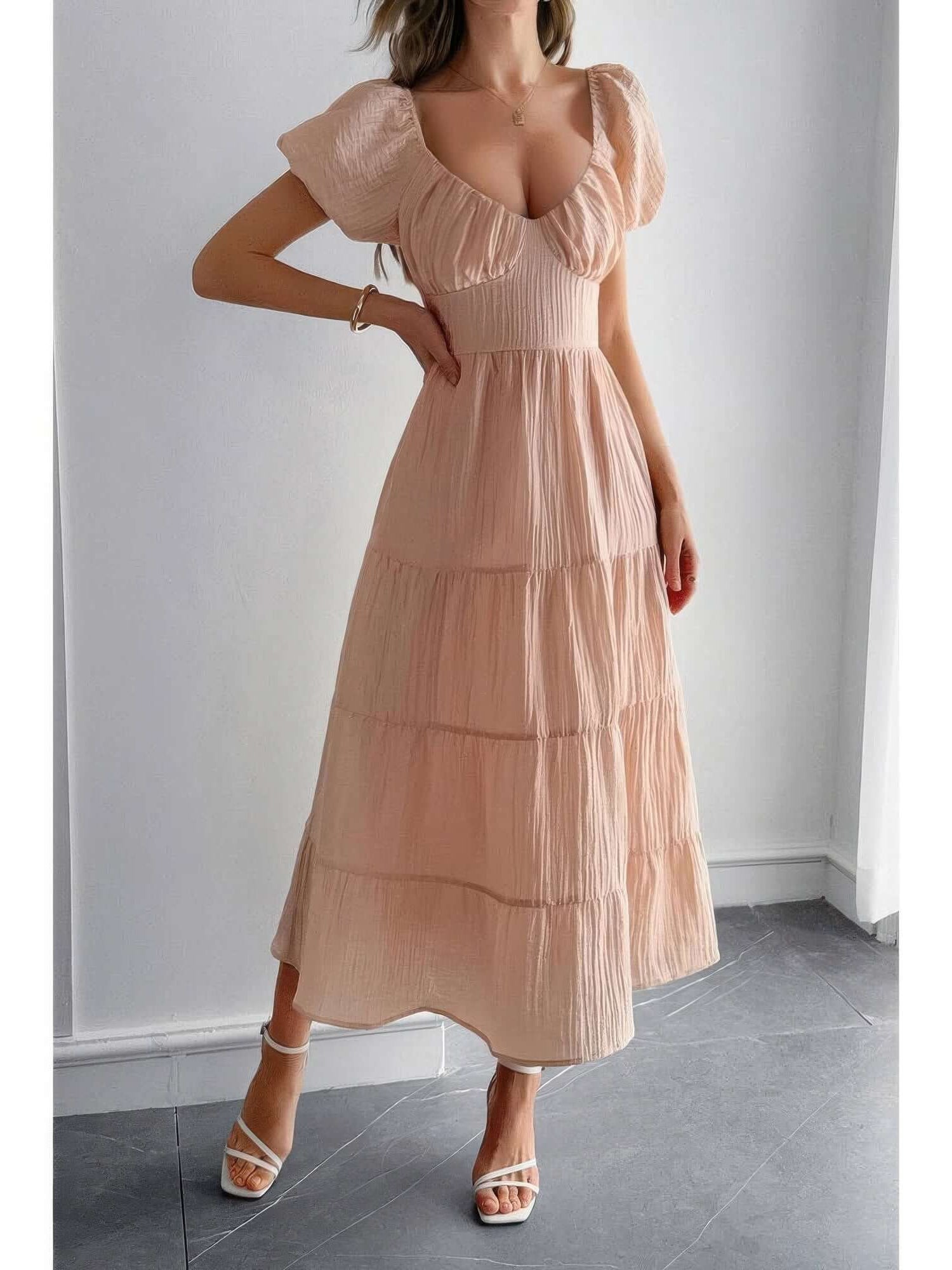 Solid Backless Tiered Puff Sleeve Fit Midi Dress in soft pink with charming puff sleeves and tiered skirt.